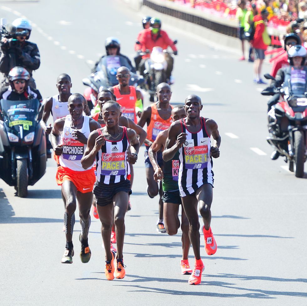 eliud-kipchoge-of-kenya-tracks-race-leaders-during-the-news-photo-1022769826-1551717558.jpg