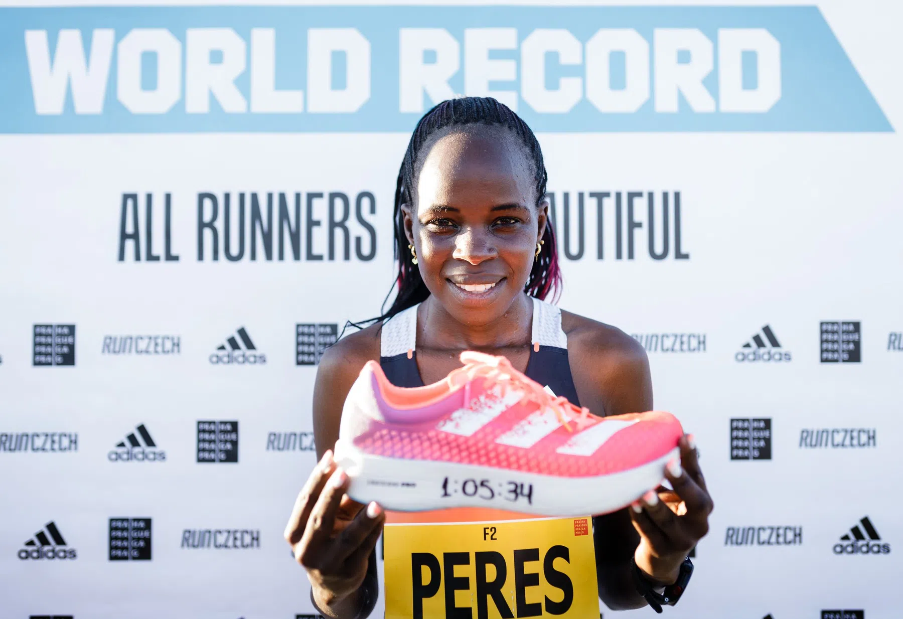 Peres Jepchirchir smashes the women's only half marathon record wearing adidas adizero adios pro 12.jpg